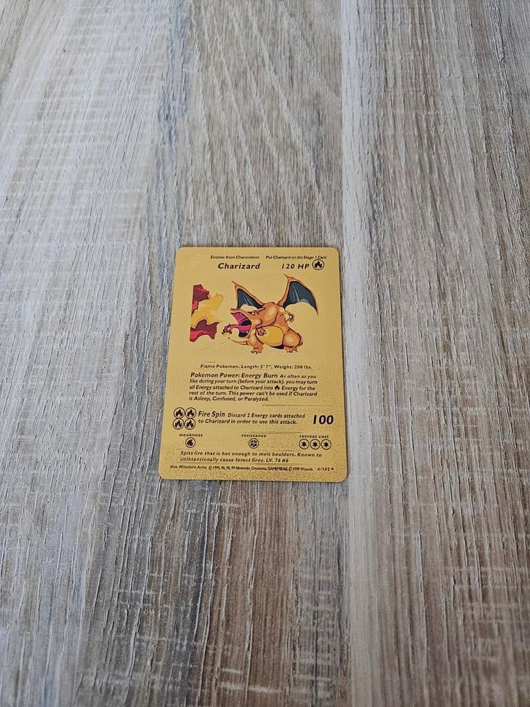 Charizard gold metal pokemon card, Hobby en Vrije tijd, Verzamelkaartspellen | Pokémon, Ophalen of Verzenden, Zo goed als nieuw