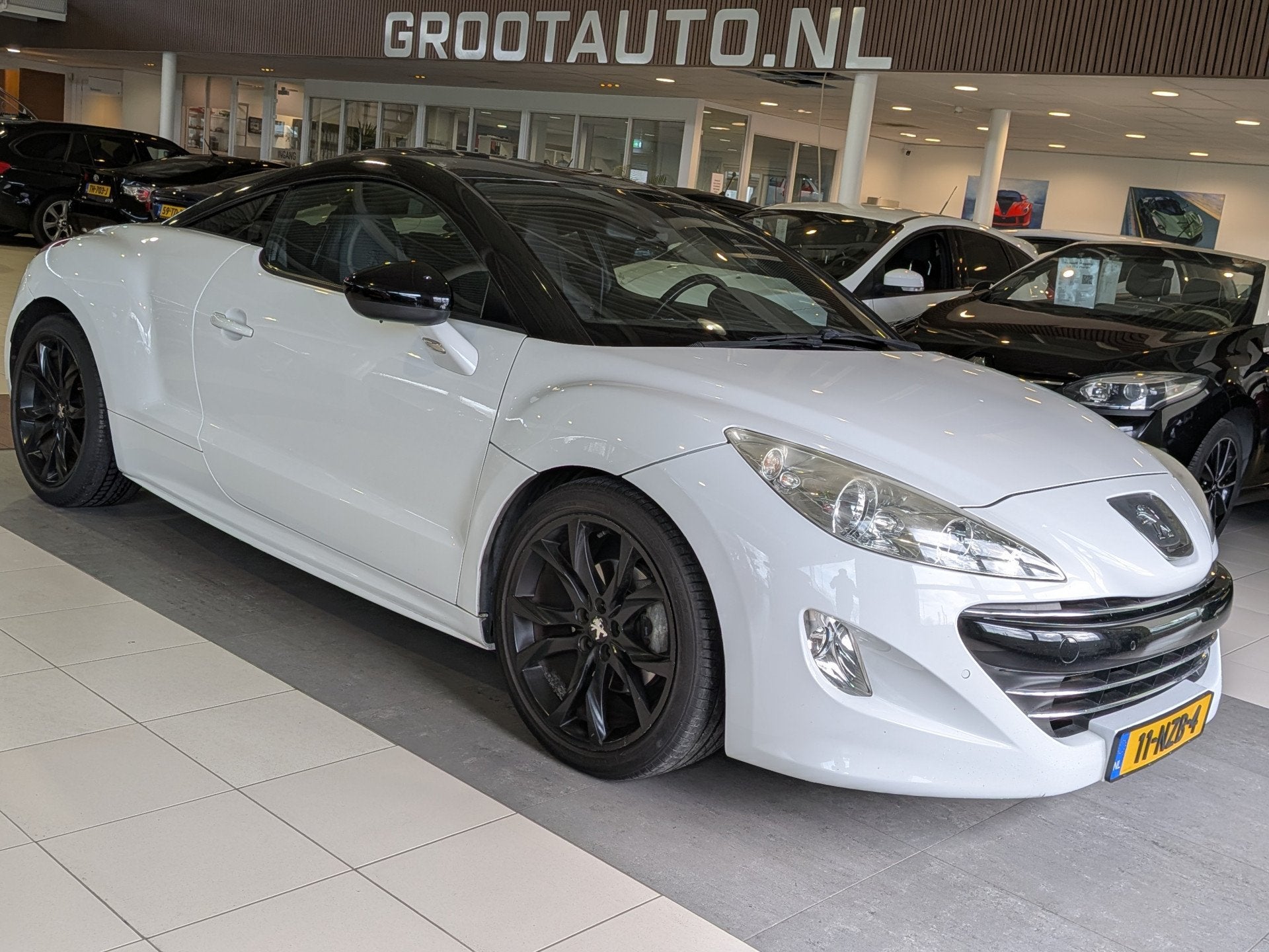 Peugeot RCZ 1.6 THP Automaat Airco, Cruise Control, Stuurbek, Auto's, Peugeot, Gebruikt, Zwart, 4 stoelen, Wit