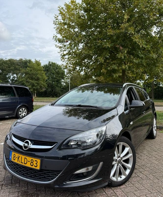 Opel Astra 1.4 Turbo 103KW Sports Tourer 2013 Zwart, Auto's, Opel, Voorwielaandrijving, 4 cilinders, Zwart, Origineel Nederlands
