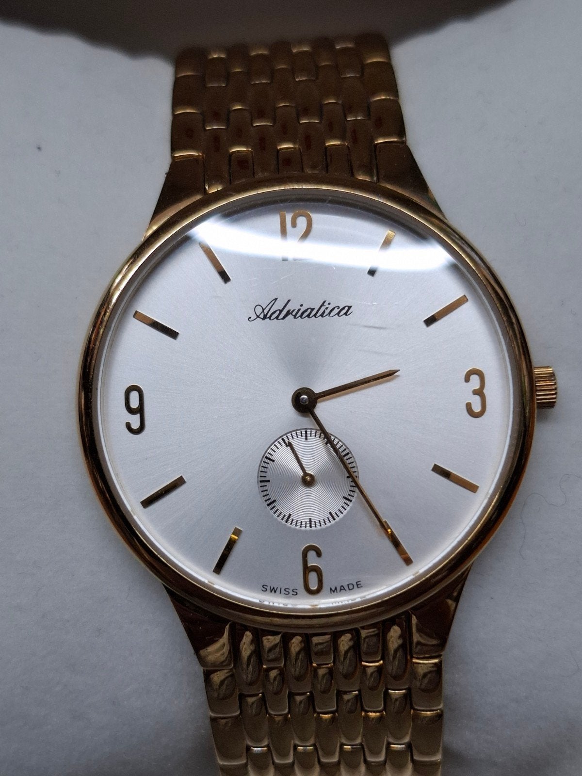 Adriatica Swiss Made Horloge - Goudkleurig Polshorloge, Antiek en Kunst, Antiek | Klokken, Ophalen of Verzenden