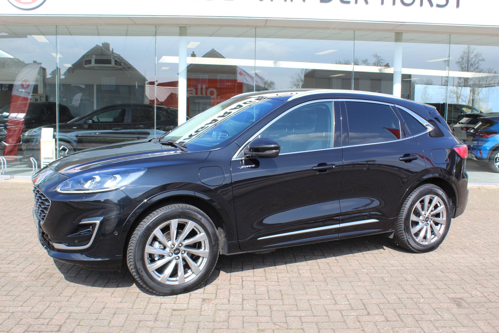 Ford Kuga 2.5-225pk PHEV 'Vignale' Plug-in Hybrid Automaat., Auto's, 12 maanden, Gebruikt, Zwart, 4 cilinders