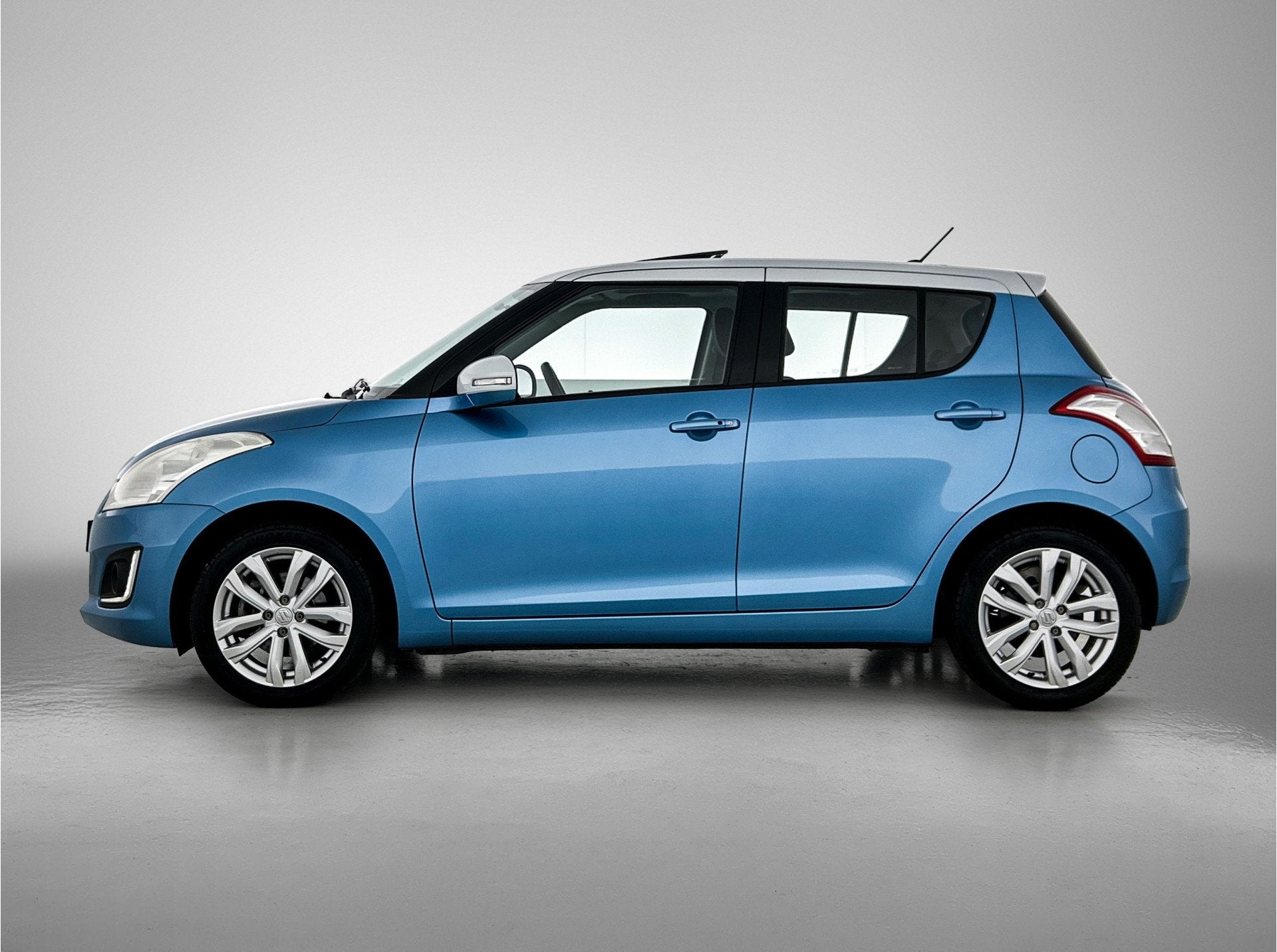 Suzuki Swift 1.2 Exclusive EASSS (bj 2014), Auto's, Suzuki, Voorwielaandrijving, Stof, Gebruikt, 4 cilinders