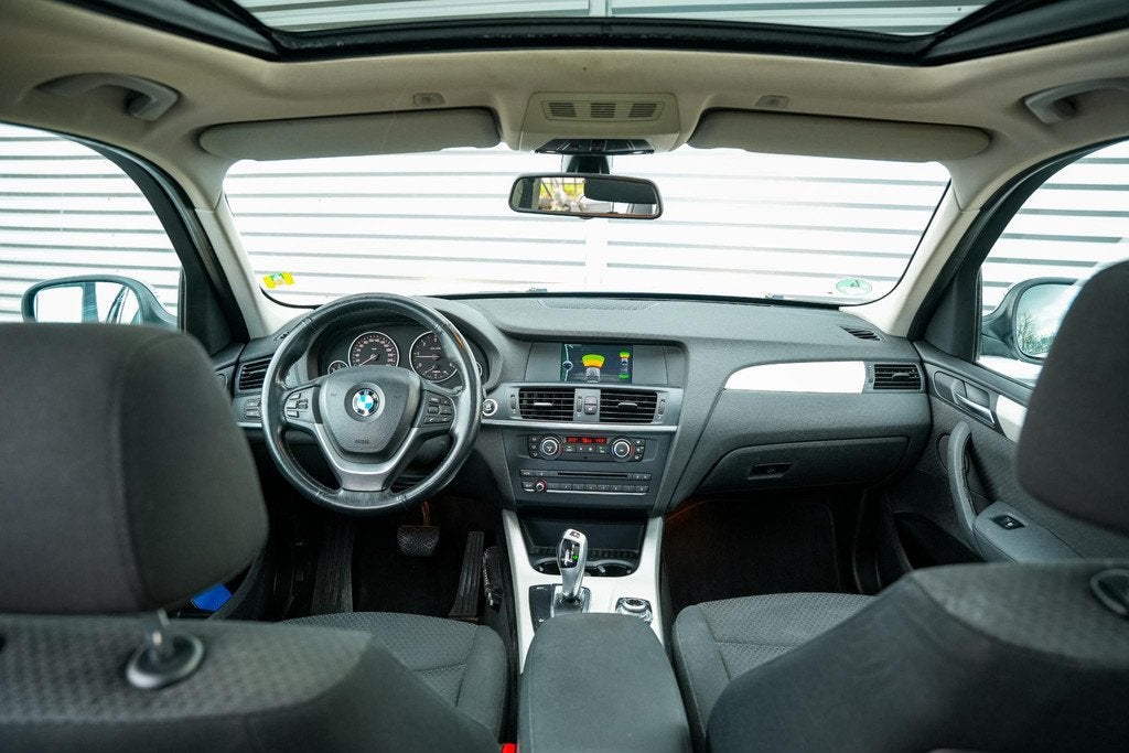 BMW X3 xDrive20d Executive Trekhaak Panoramadak Parkeersenso, Automaat, Euro 5, Stof, Zwart
