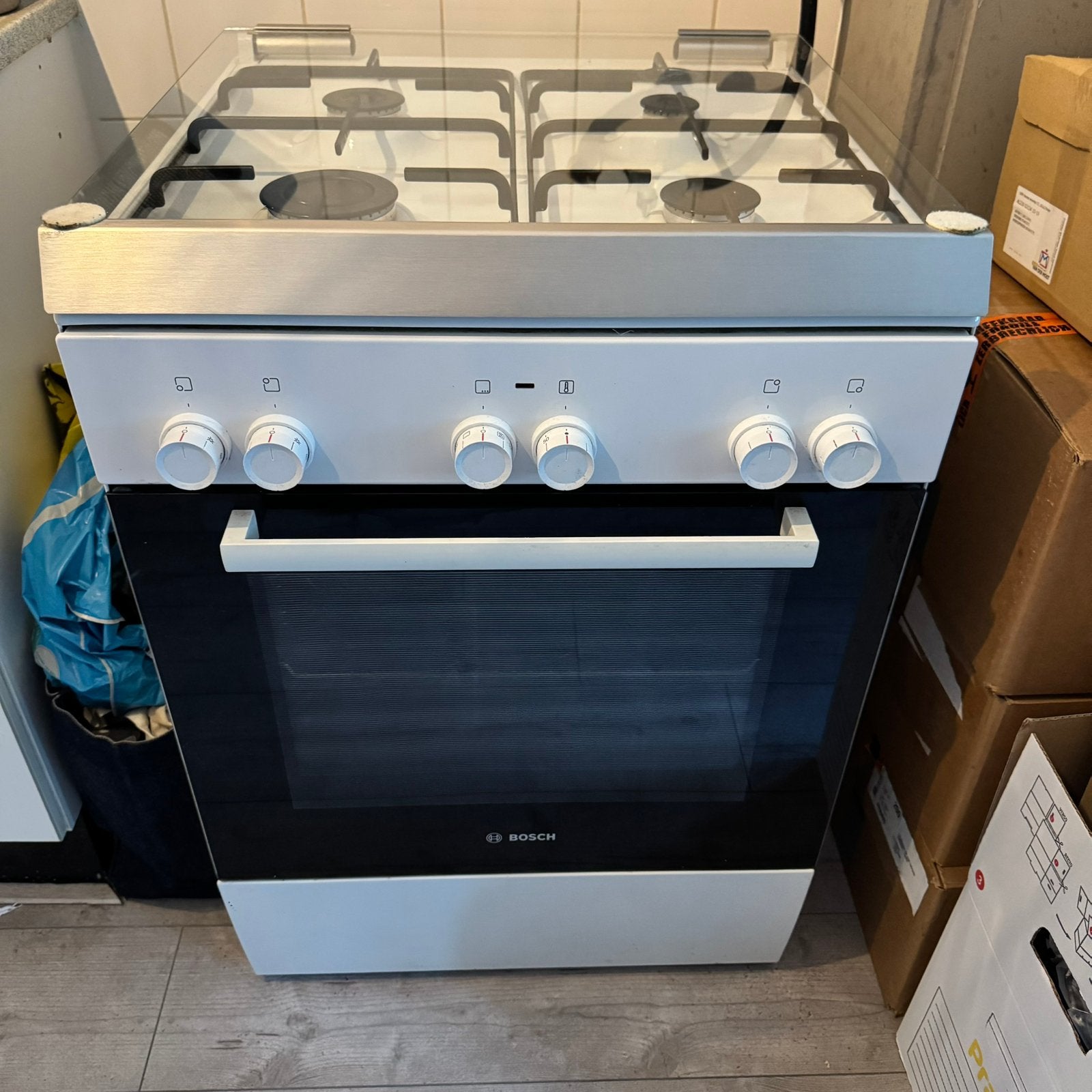 Bosch 4-pits fasfornuis, Ophalen, 4 kookzones, Zo goed als nieuw, Gas