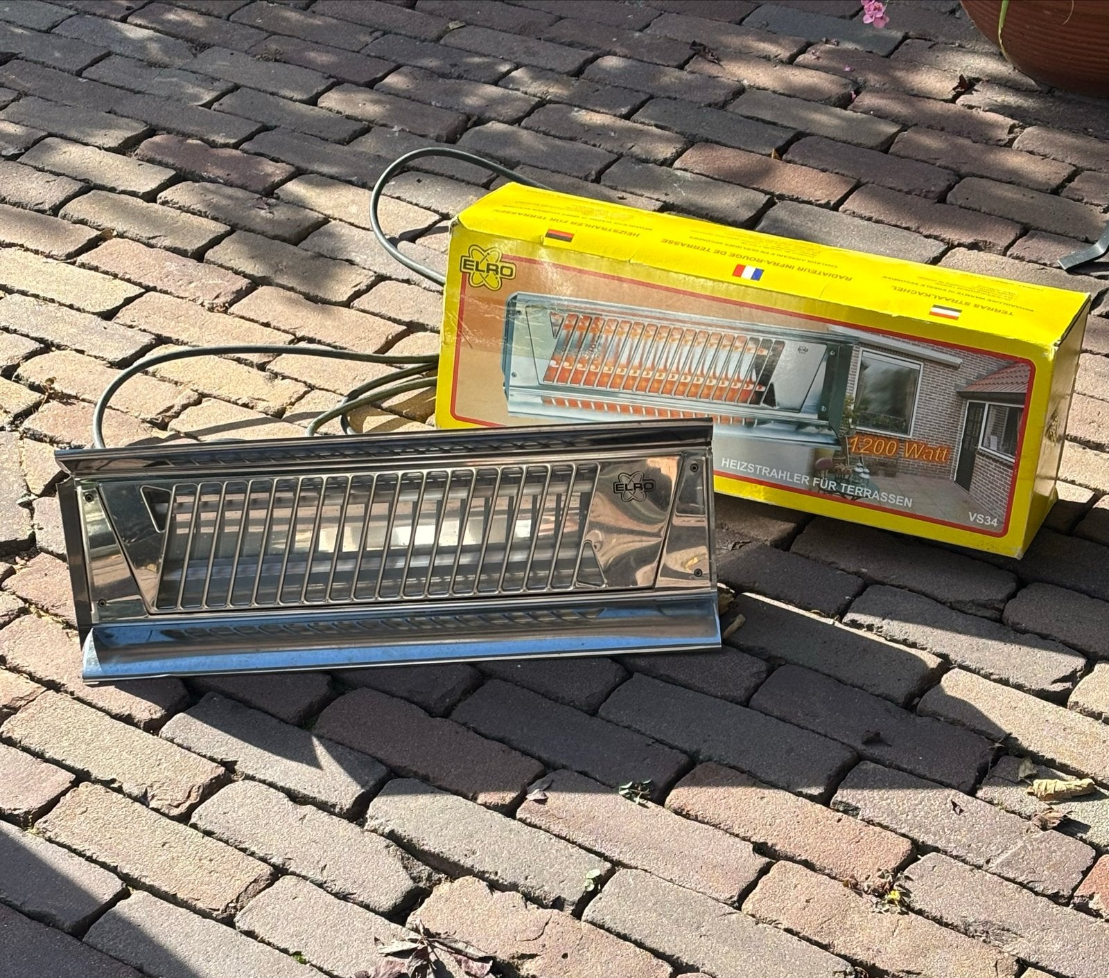 ELRO Terrasstraalkachel 1200W - Spatwaterdicht, Zo goed als nieuw, Waterbestendig, Wand, Ophalen