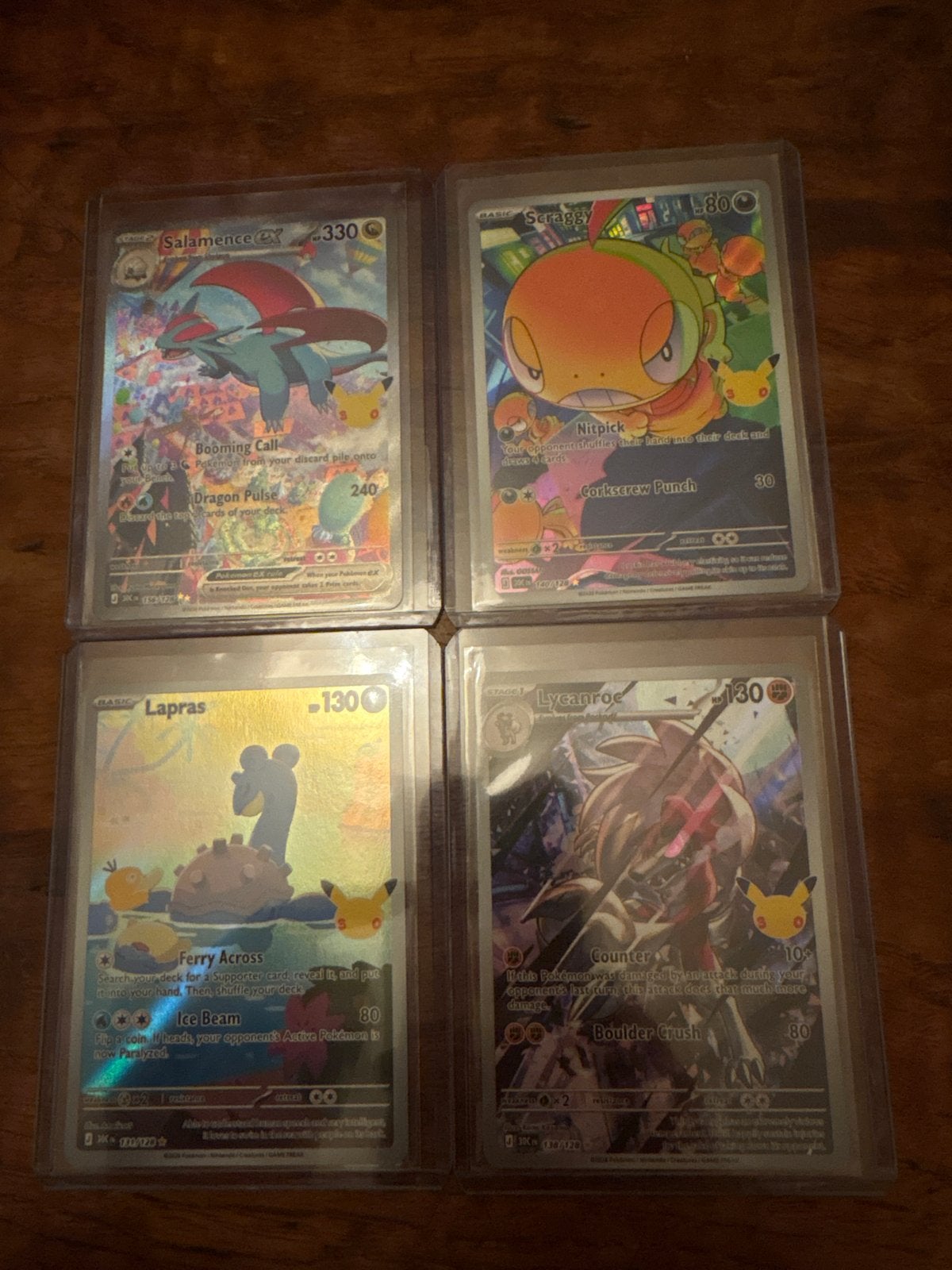 Salamence EX, Scraggy, Lapras, Lycanroc pokemon 30th, Ophalen of Verzenden, Zo goed als nieuw, Meerdere kaarten