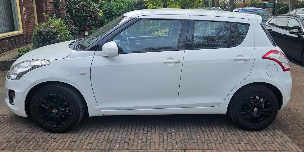 Suzuki Swift 1.2 5-D 2016 Wit 93pk, Voorwielaandrijving, Stof, 4 cilinders, Sound system