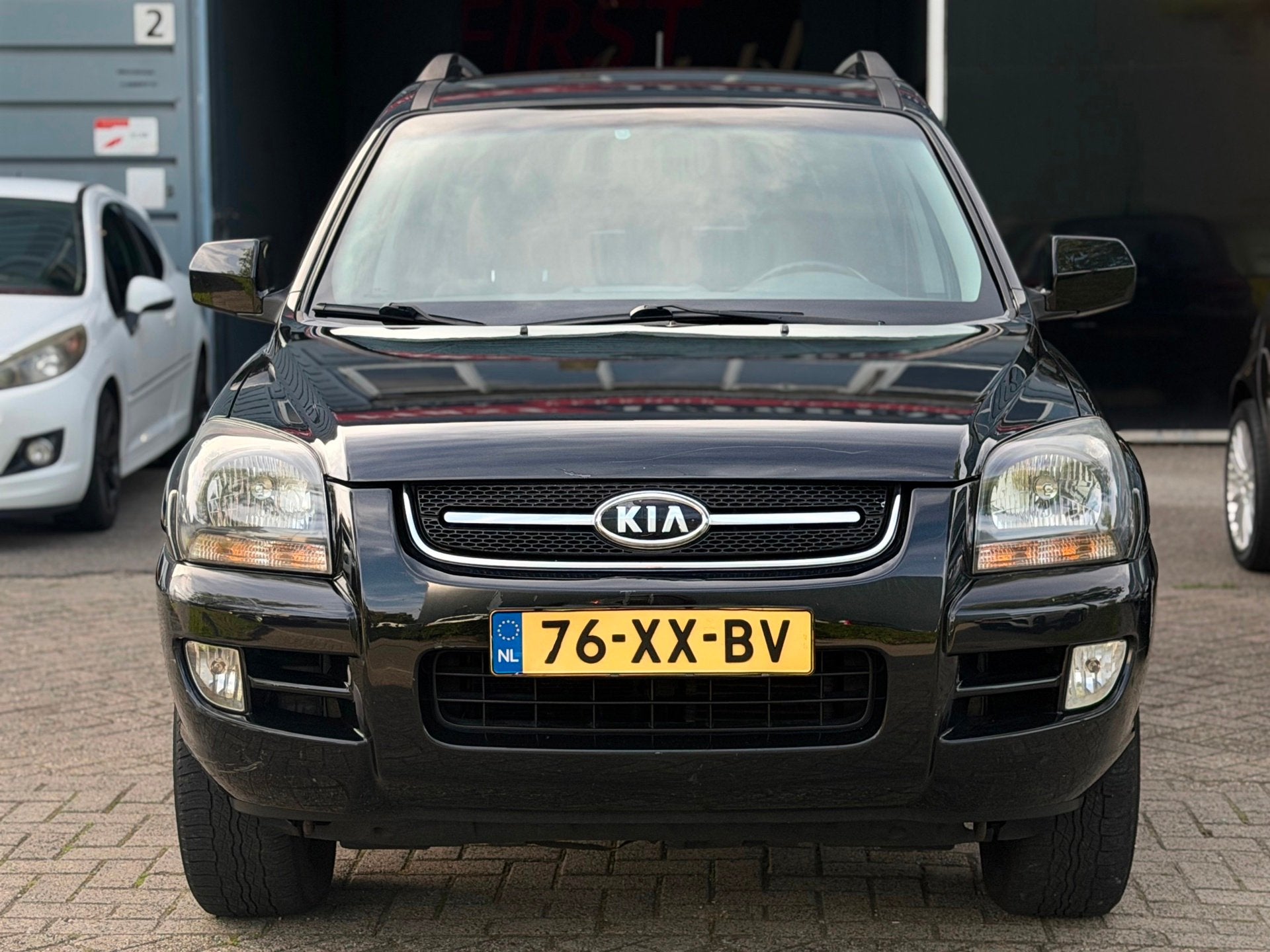 Kia Sportage 2.7 V6 Adventure 4WD AUTOMAAT NAVI/AIRCO/CRUISE, Automaat, Stof, Gebruikt, Zwart