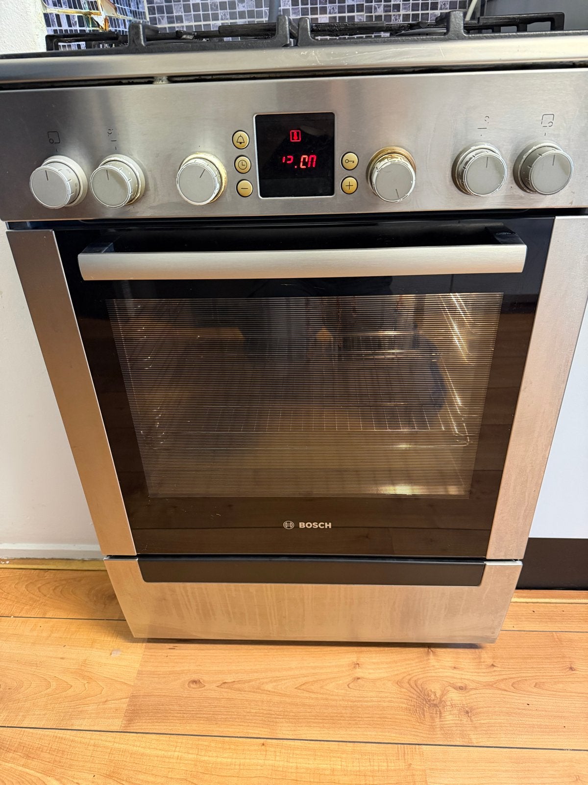 Bosch Gasfornuis met Oven - Vrijstaand, 4 Kookzones, Ophalen, Gebruikt, Hete lucht, 60 cm of meer