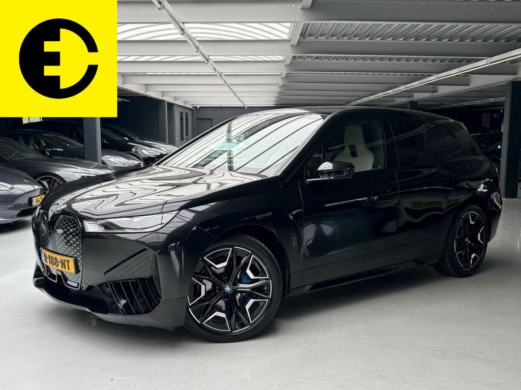 BMW iX xDrive40 High Executive 77 kWh | 98,4% SOH | Stoelver, Automaat, 34 min, Gebruikt, Zwart