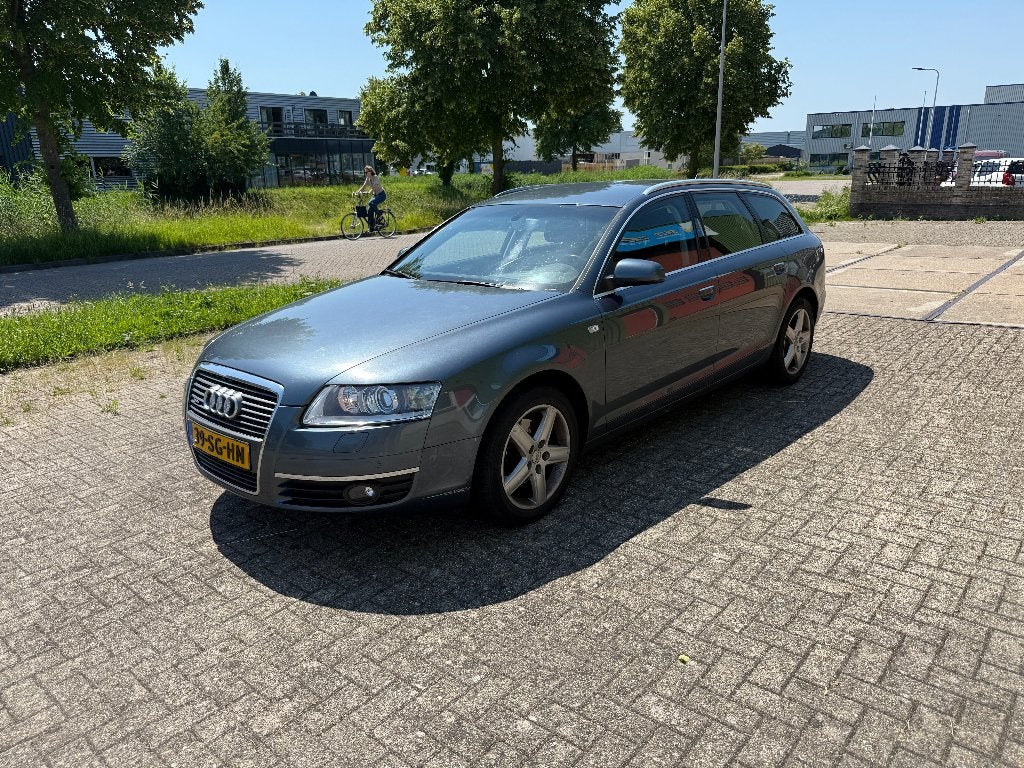 Audi A6 2.4 V6 130KW Avant AUT 2006  Export/Loop/Sloop, Auto's, Audi, Stof, 1800 kg, Zwart, Blauw