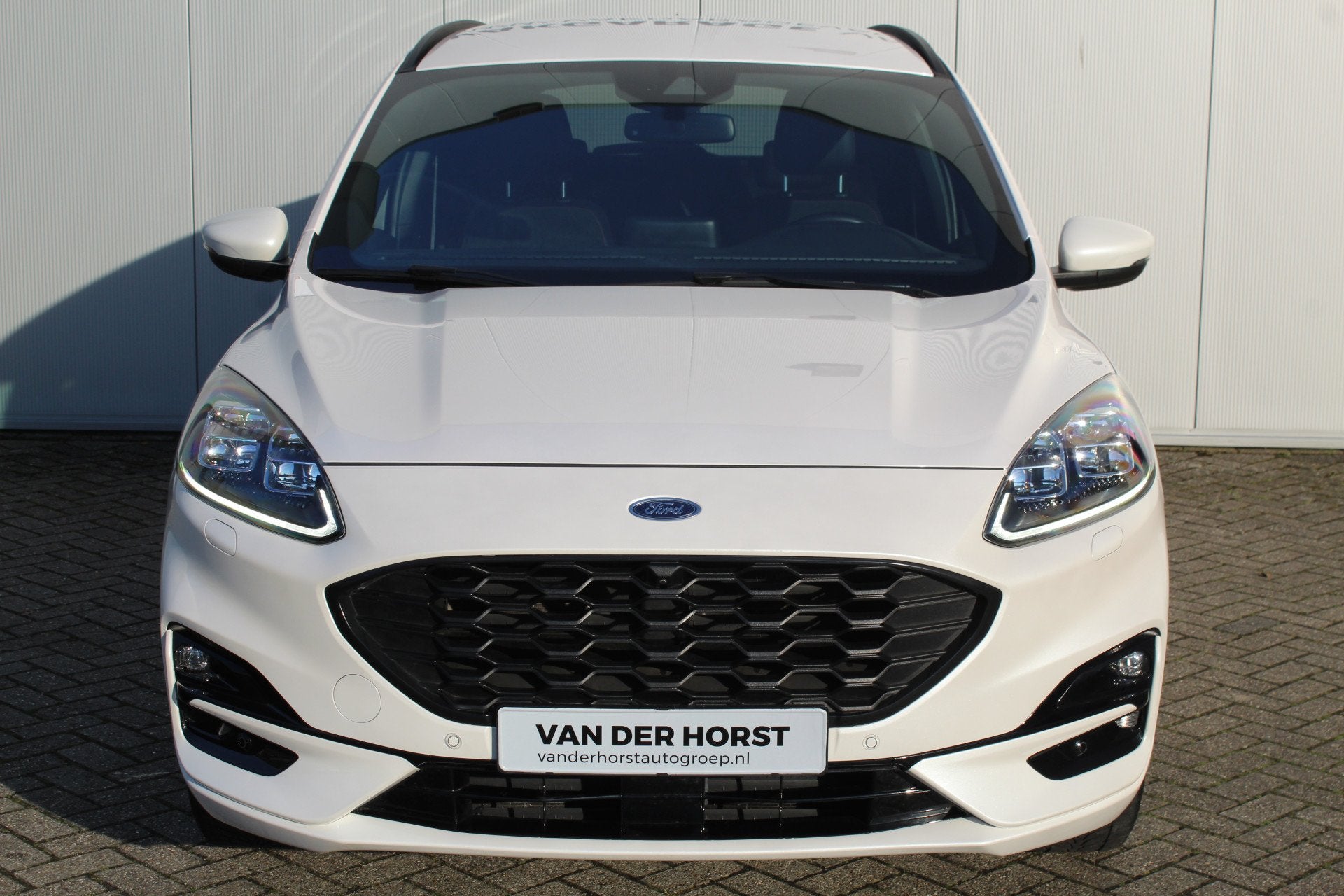 Ford Kuga 2.5-225pk Plug-in Hybrid ST-Line X. Hybride rijden, Gebruikt, Zwart, 4 cilinders, Leder en Stof