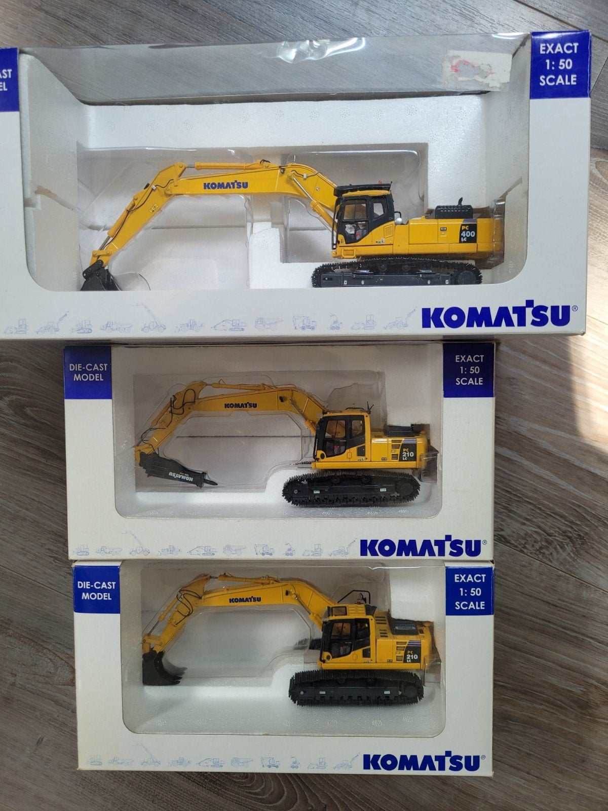 3x komatsu graafmachine, Ophalen of Verzenden, Zo goed als nieuw, Bus of Vrachtwagen