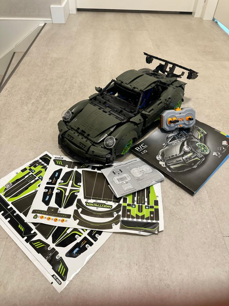 Porsche 911 R/C met afstandsbediening, boekje en stickers, Hobby en Vrije tijd, Elektro, Ophalen of Verzenden, Zo goed als nieuw