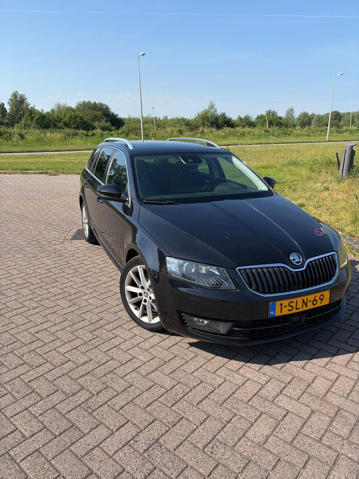 Skoda Octavia 1.6 TDI 77KW Combi Dsg-7 2013 Zwart, Auto's, Skoda, 4 cilinders, Zwart, Origineel Nederlands, Diesel