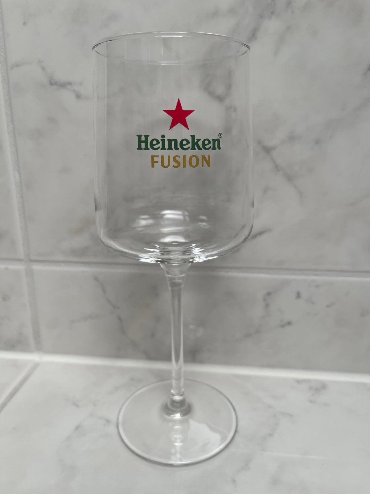 HEINEKEN GLAS - FUSION - leuk voetglas, Ophalen of Verzenden, Nieuw, Glas of Glazen, Heineken