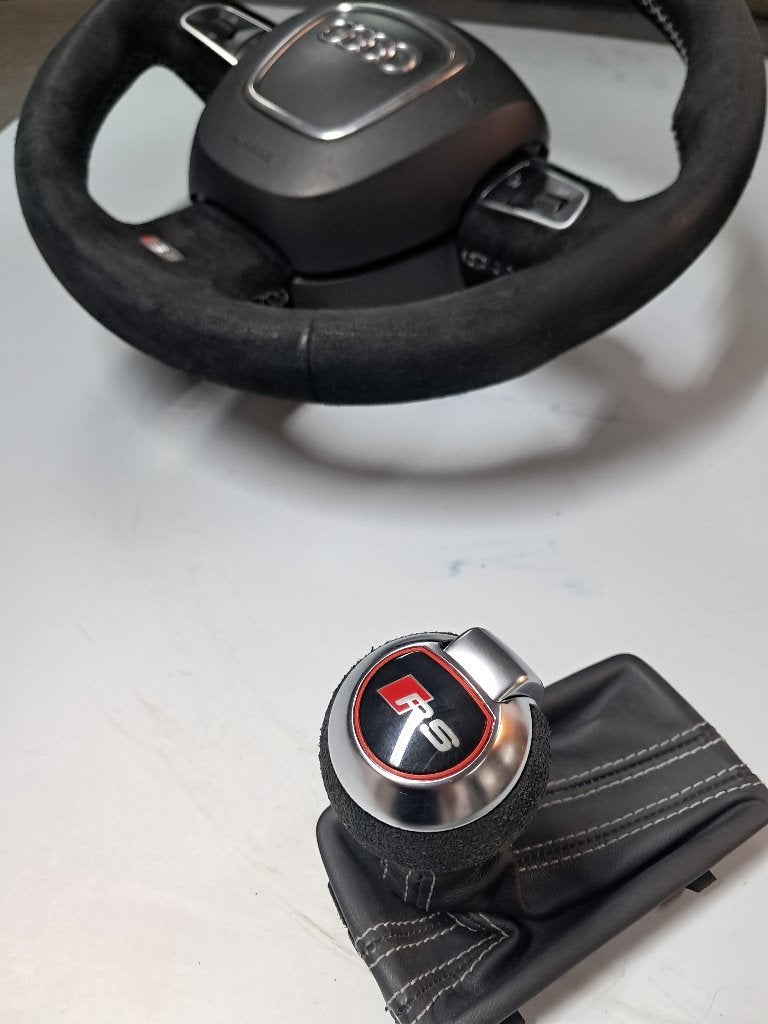 Alcantara RS5 stuur en pook, Ophalen