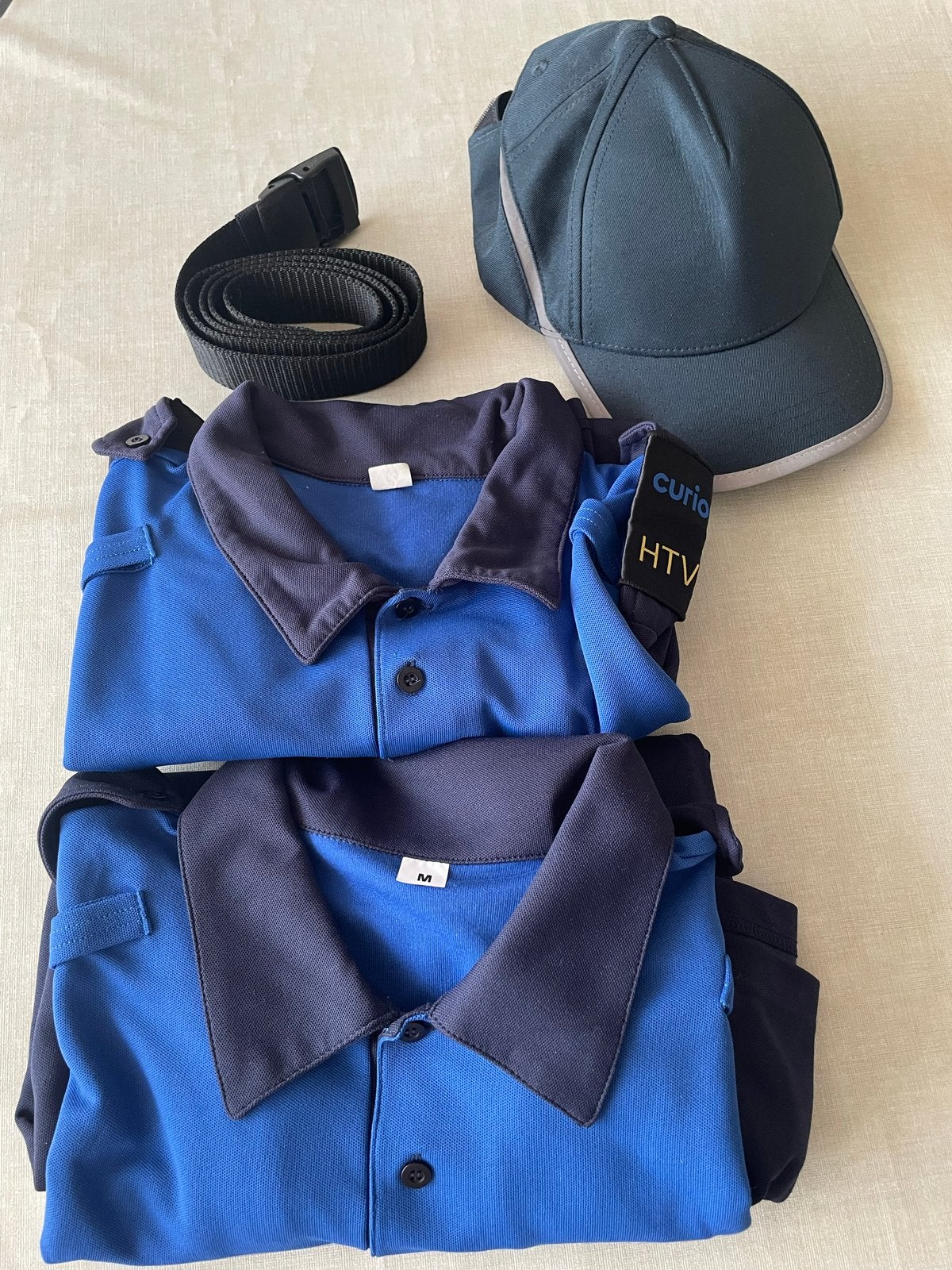 Curio HTV Opleiding Kledingpakket (2 shirts, pet, riem), Kleding | Heren, Ophalen of Verzenden, Zo goed als nieuw