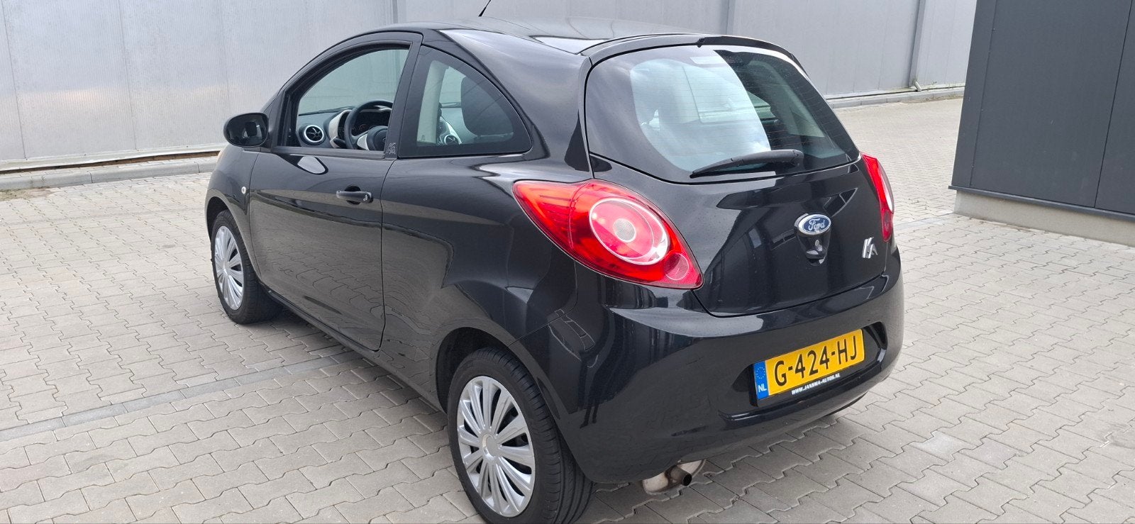 Ford Ka 1.2 51KW 2009 Zwart nieuwe APK, 153000k, en airco., Auto's, Voorwielaandrijving, 1242 cc, 4 cilinders, 4 stoelen