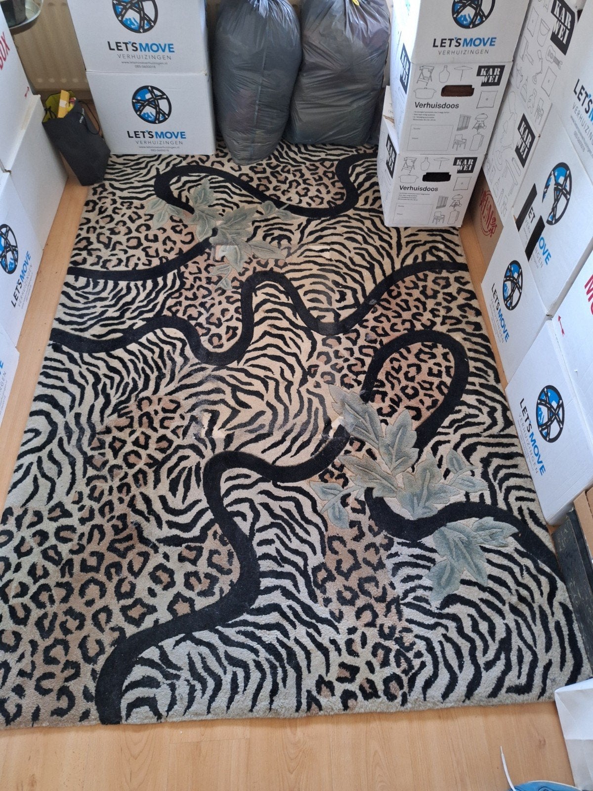 Vloerkleed met dierenprint en bladeren, Ophalen, Gebruikt, Groen, 150 tot 200 cm