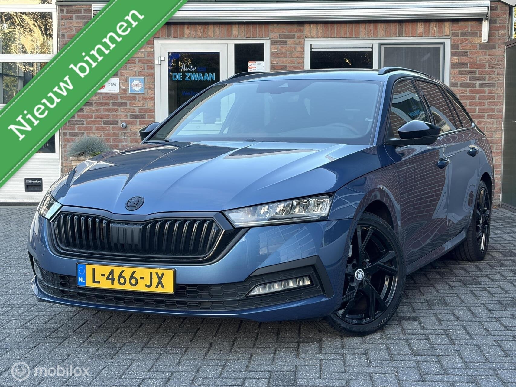 Skoda Octavia Combi 1.0 TSI Sport Business|Wegklapbare Trekh, Auto's, Voorwielaandrijving, Dealer onderhouden, Gebruikt, Euro 6
