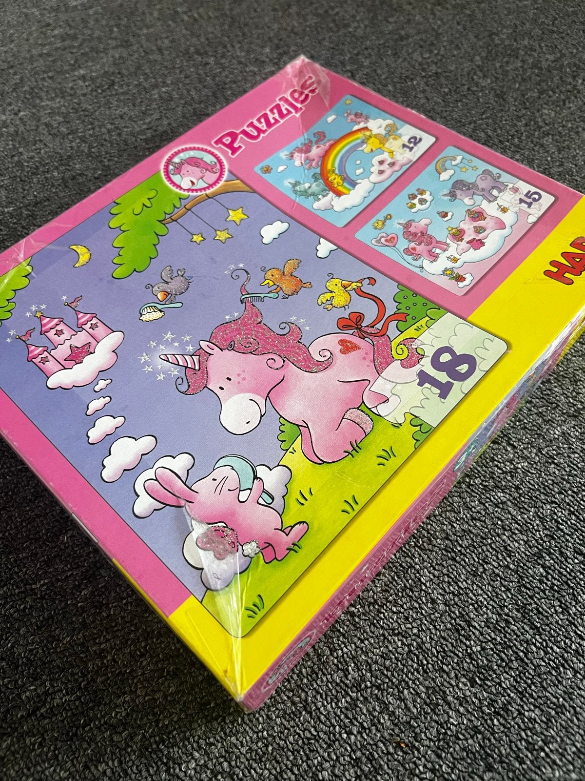 HABA Eenhoorn Glittergeluk Puzzels (12, 15, 18 stukjes), Ophalen of Verzenden, 10 tot 50 stukjes, Zo goed als nieuw, 2 tot 4 jaar