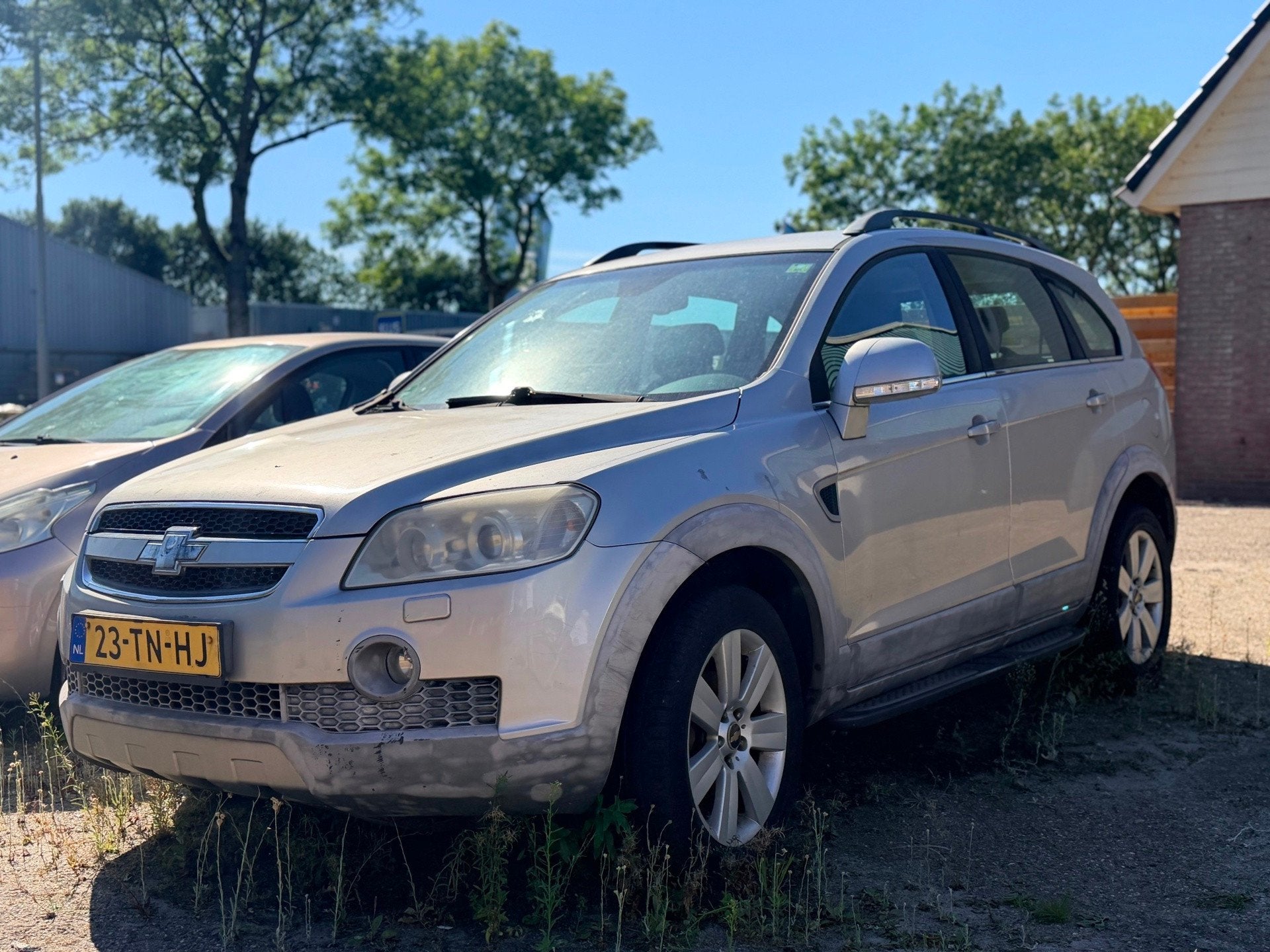 Chevrolet Captiva 2.4i Executive, Gebruikt, Bedrijf, Handgeschakeld, Zilver of Grijs