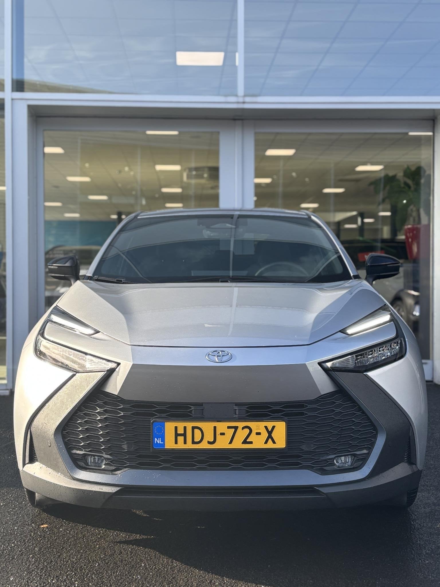 Toyota C-HR 2.0 Plug-in Hybrid 220 Dynamic | LM Velgen | Nav, Auto's, 4 cilinders, Bedrijf, Grijs, Hybride Elektrisch/Benzine