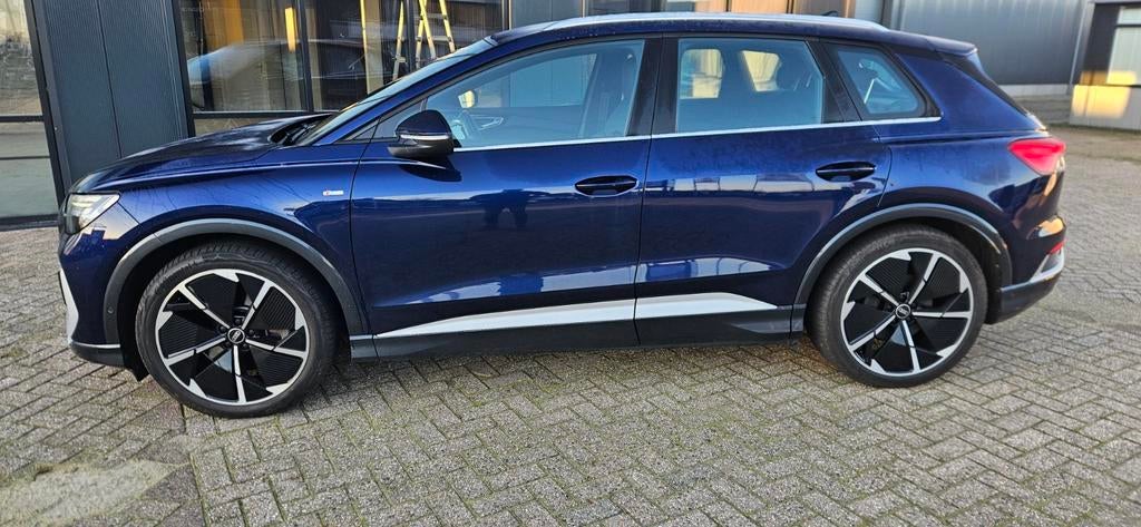 Audi Q4 50e e-tron Quattro S-Line Matrix Ambiance , vol leer, Auto's, Automaat, Blauw, Particulier, Dealer onderhouden