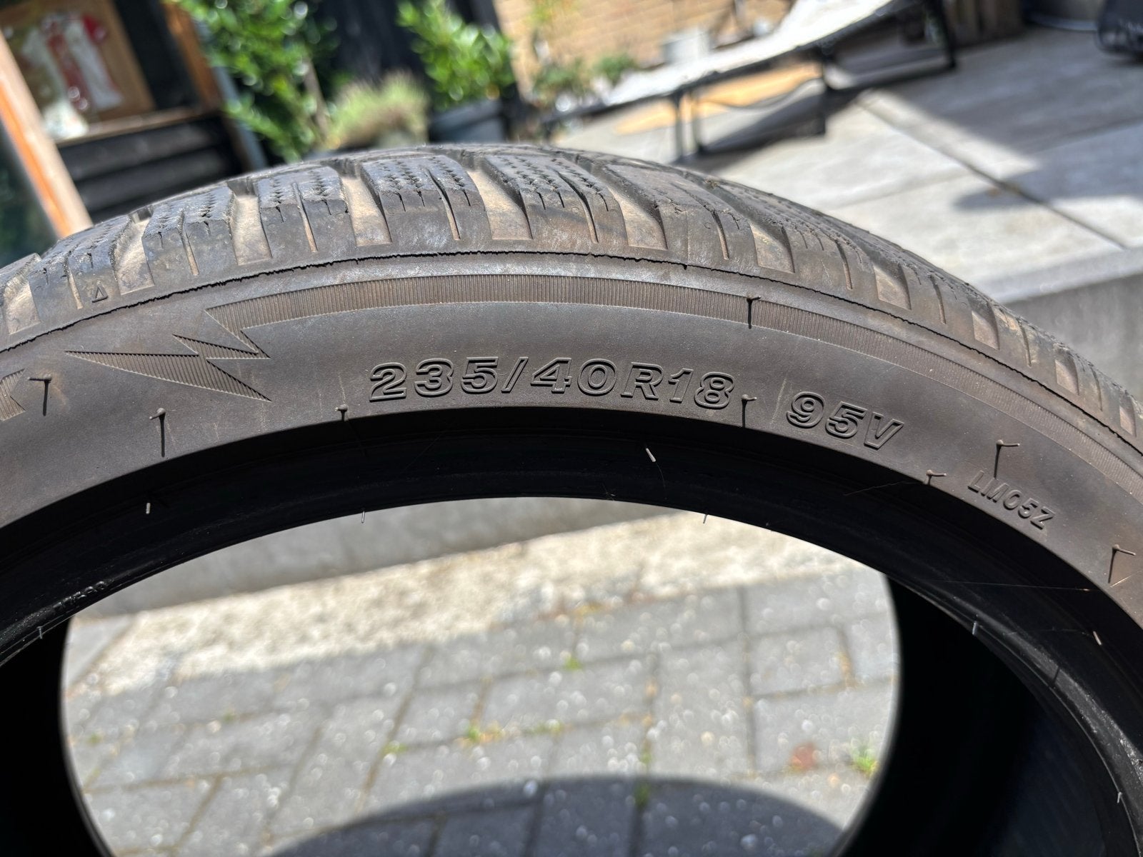 Bridgestone Blizzak LM005 Winterband 235/40R18 95V (4mm), Ophalen, Gebruikt