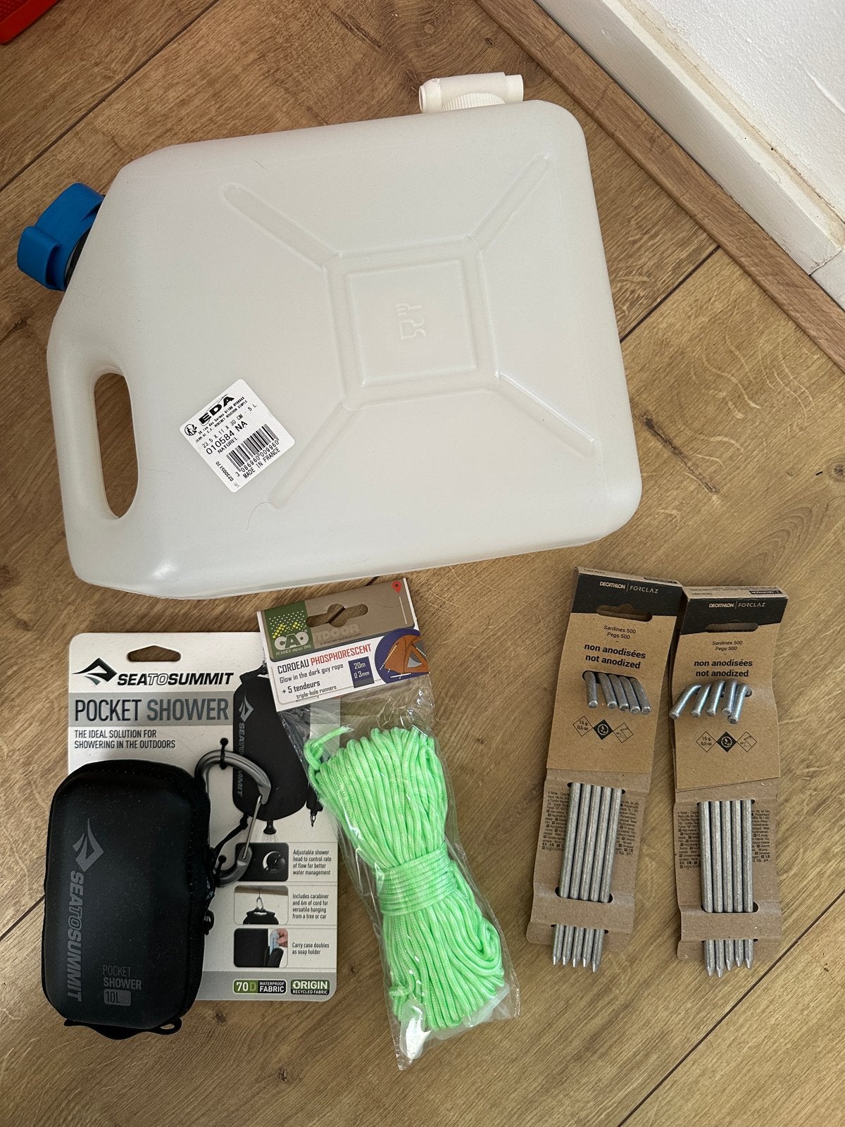 Kampeerbenodigdheden: Douche, jerrycan, haringen, touw, Ophalen of Verzenden, Nieuw