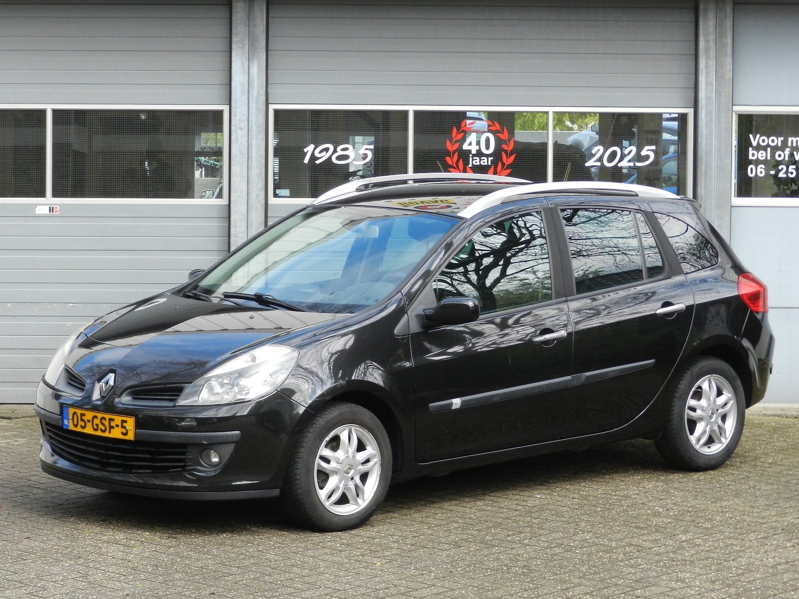 Renault Clio Estate 5Deurs 1.2 TCE Corporate Climate en Crui, Auto's, Voorwielaandrijving, Dealer onderhouden, Gebruikt, Zwart