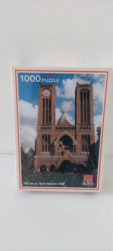 Vintage puzzel 1000 100 jaar st. bavo haarlem 1998 geseald, Ophalen of Verzenden, 500 t/m 1500 stukjes, Nieuw, Legpuzzel