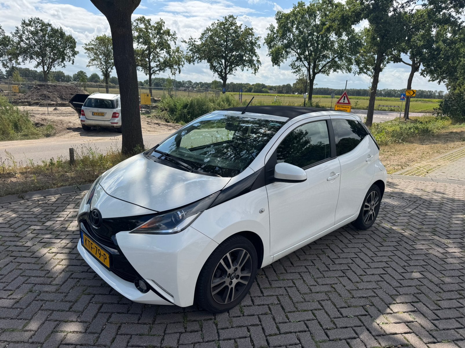Toyota Aygo 1.0 2014 AIRCO/CRUISE/OPEN DAK, Voorwielaandrijving, USB, Leder en Stof, Wit