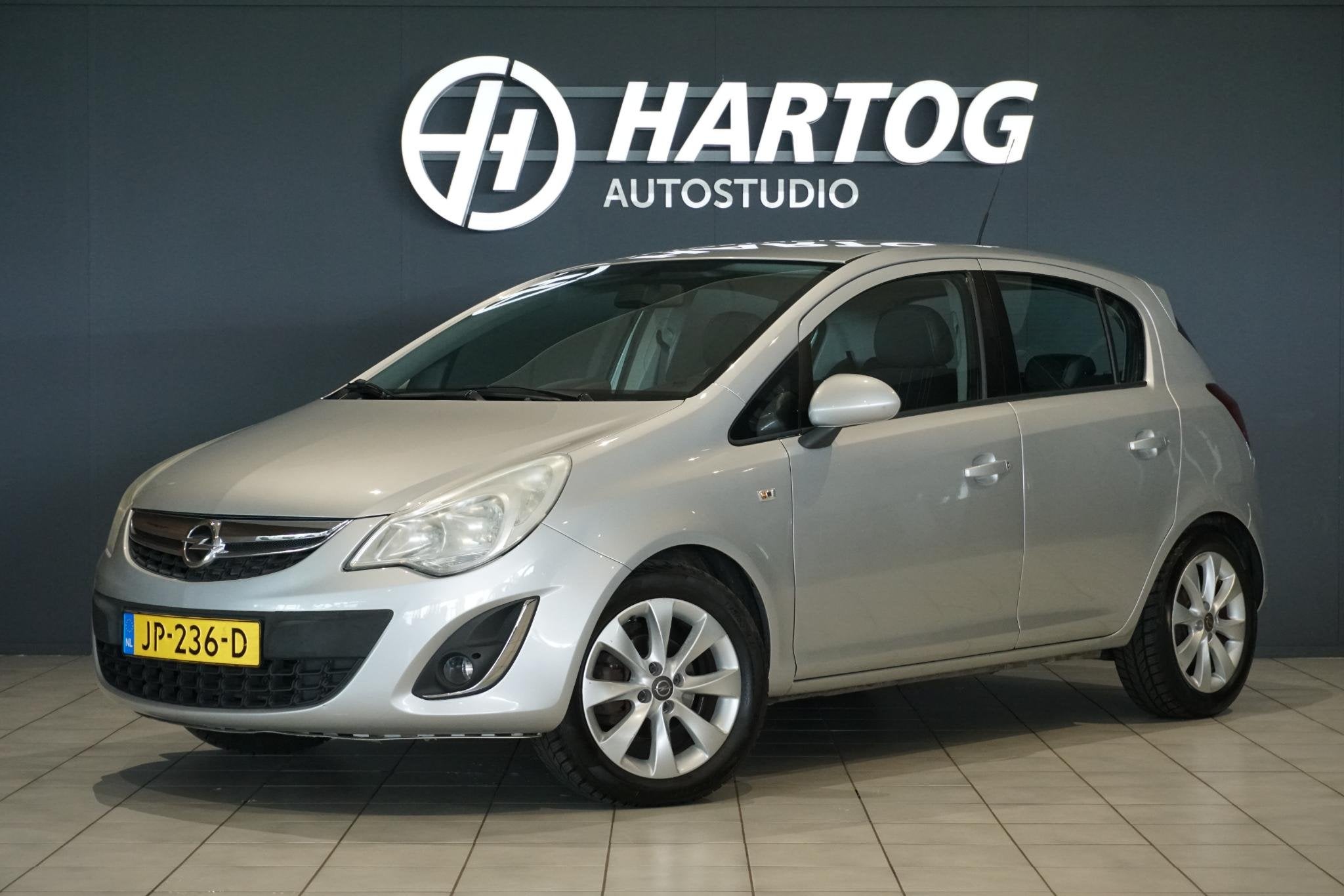 Opel Corsa 1.4-16V Anniversary Edition + CRUISE CONTROL / BL, Auto's, Voorwielaandrijving, Euro 5, Gebruikt, 4 cilinders