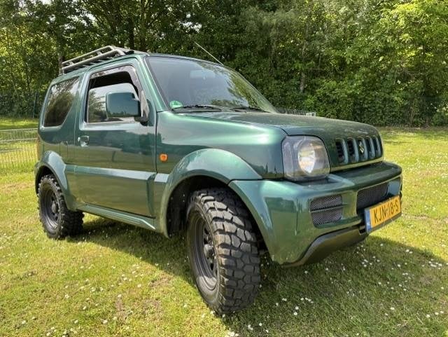 Suzuki Jimny 1.3 JX RANGER/4WD/NETTE AUTO/NIEUWE APK!, Auto's, Euro 5, Gebruikt, 4 stoelen, 14 km/l