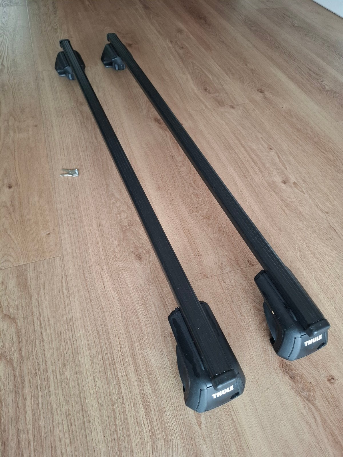 Thule dakdragers met sleutels, Ophalen