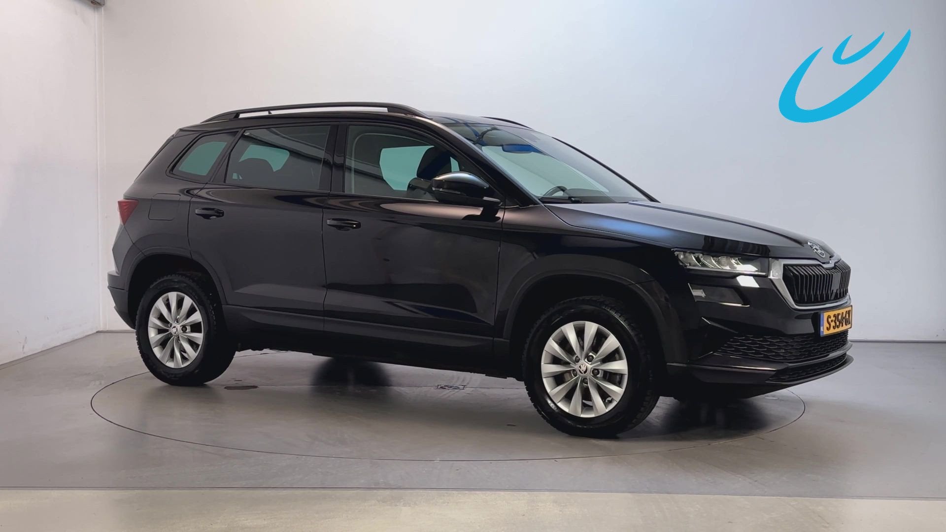 Skoda Karoq 1.5 TSI DSG ACT Business Edition Navigatie Trekh, Auto's, Dealer onderhouden, Stof, 4 cilinders, Zwart