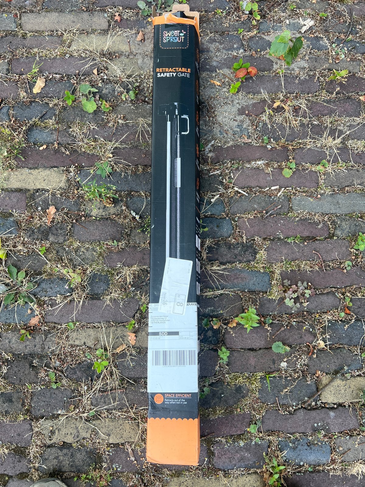 Sweet & Sprout Oprolbaar Veiligheidshekje Zwart 150cm, Kinderen en Baby's, Traphekjes, Ophalen, Overige materialen, Nieuw, Oprolhekje