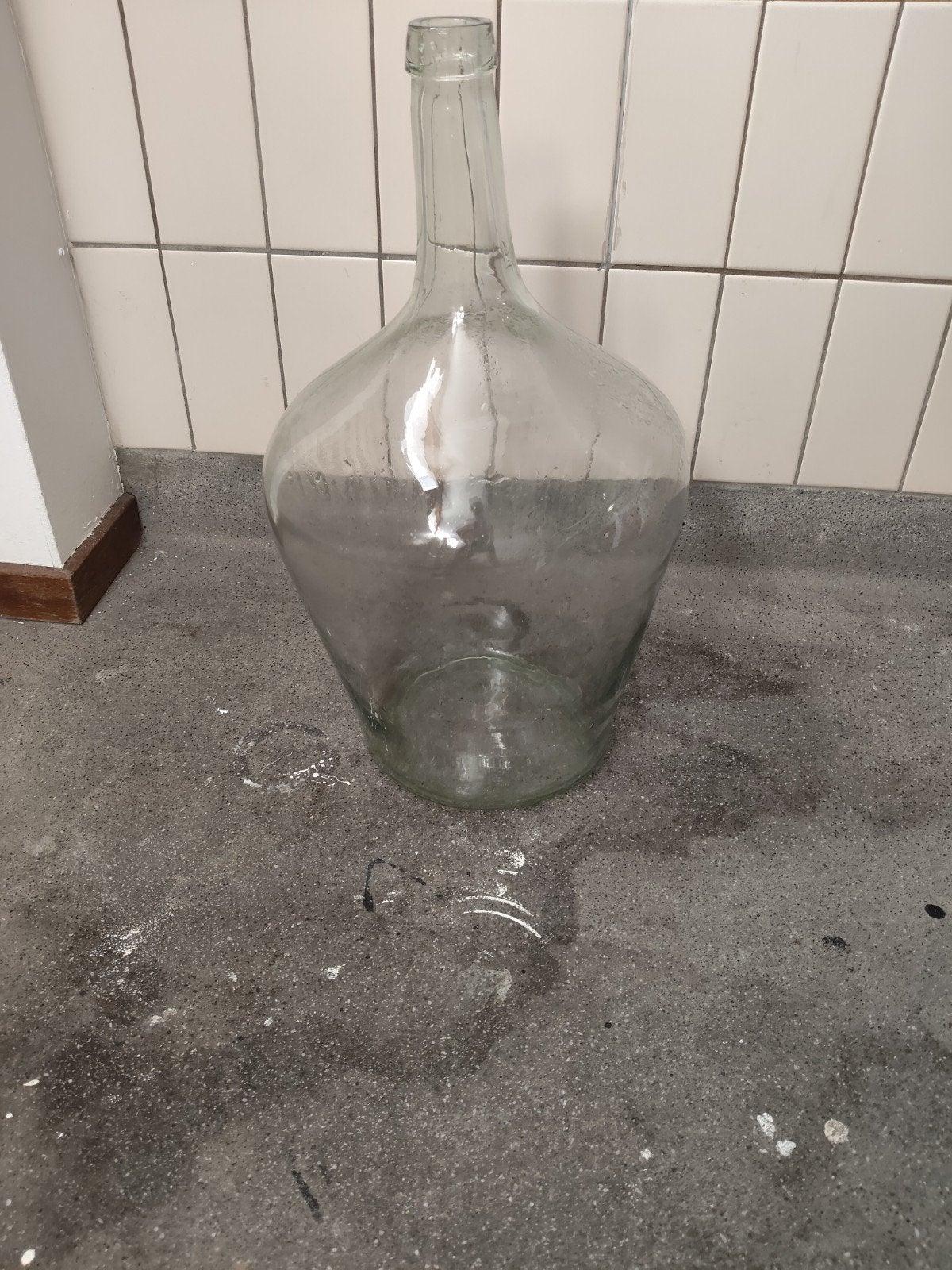 Grote glazen fles / mandfles / gistfles, Ophalen