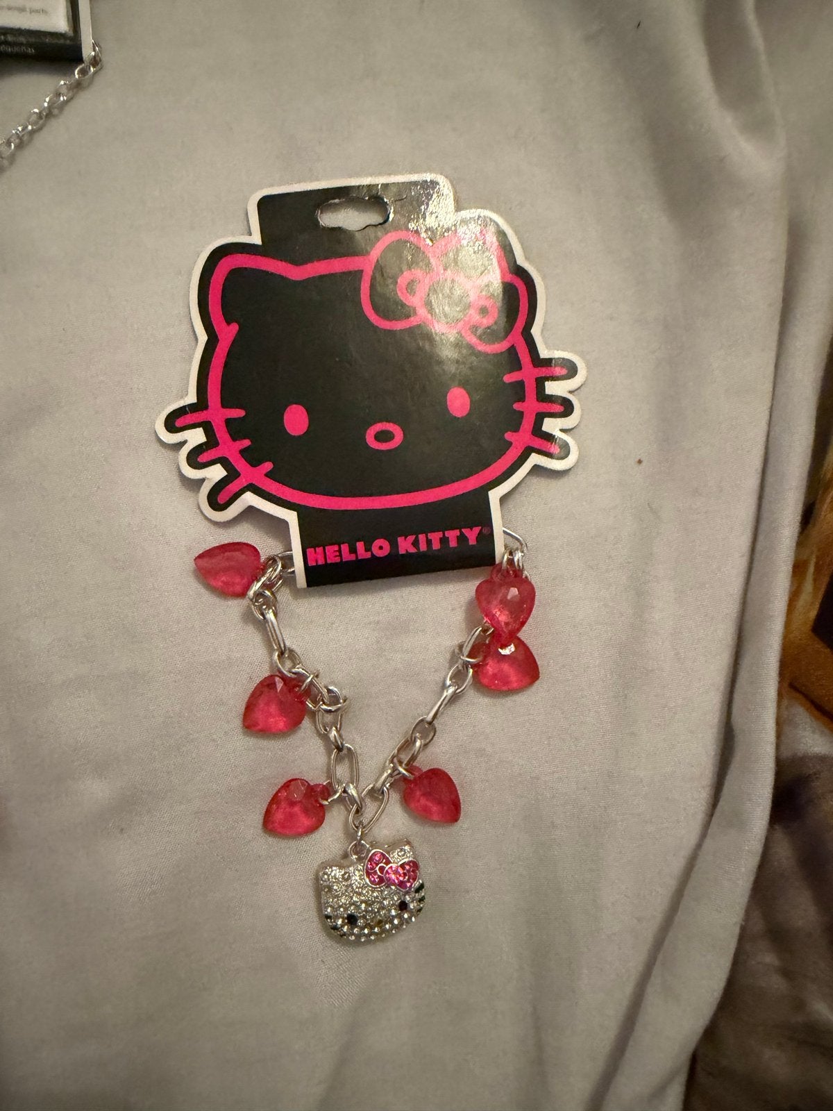 Hello Kitty Armband met bedels en strass, Overige materialen, Nieuw, Ophalen of Verzenden, Roze
