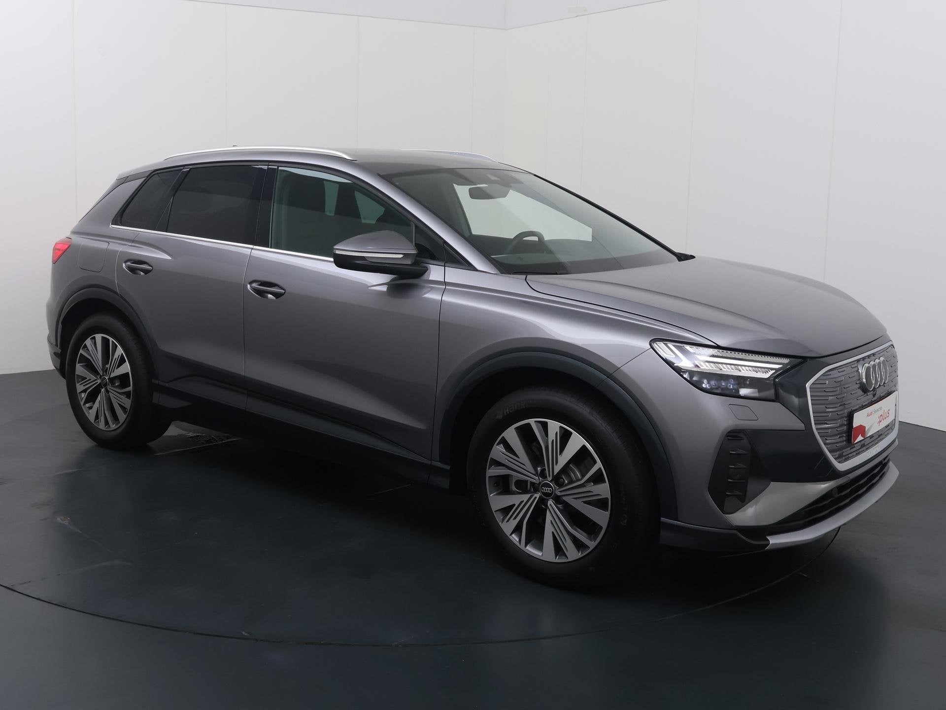 Audi Q4 e-tron Advanced edition 45 quattro 210 kW / 286 PK |, Auto's, Stof, Zwart, 82 kWh, Met garantie (alle)