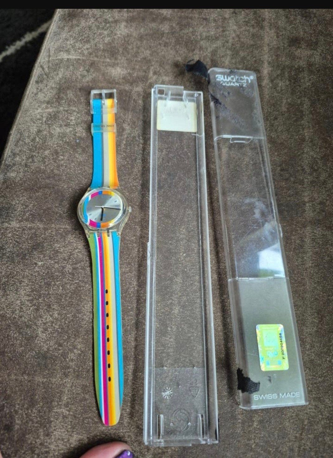 Swatch Quartz Athens 2004 met de originele doorzichtige doos, Sieraden, Tassen en Uiterlijk, Horloges | Kinderen, Ophalen of Verzenden