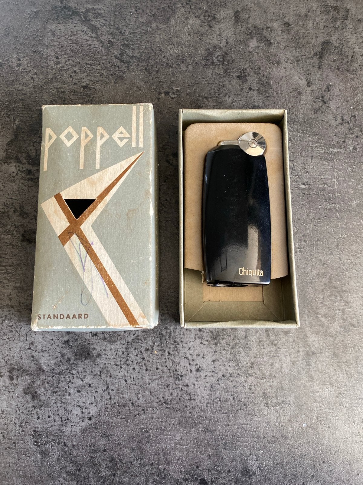 Vintage Poppell Chiquita aansteker in originele doos, Verzamelen, Ophalen of Verzenden, Gebruikt, Aansteker