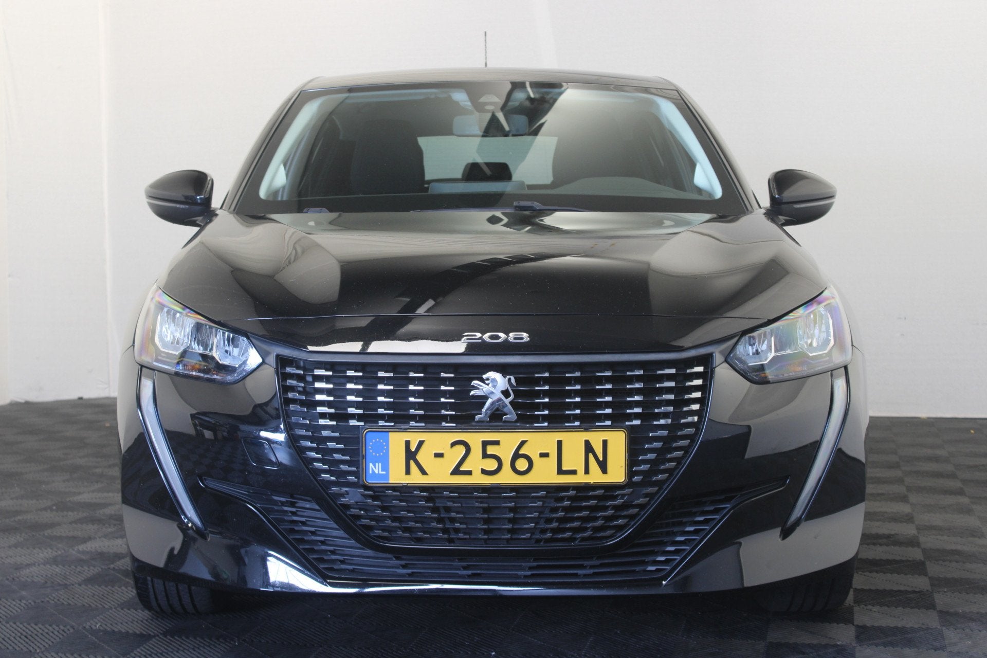 Peugeot 208 1.2 PureTech Blue Lease Active (bj 2021), Auto's, Voorwielaandrijving, Stof, 1199 cc, Zwart