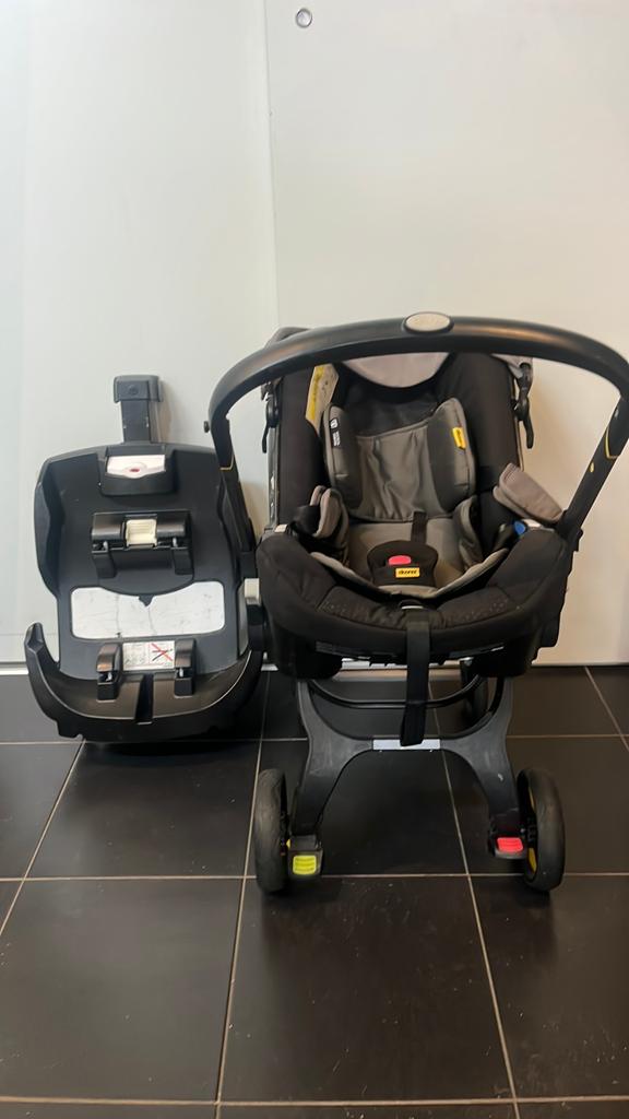 Doona autostoel/buggy, Autogordel, Zo goed als nieuw, 0 t/m 13 kg, Ophalen