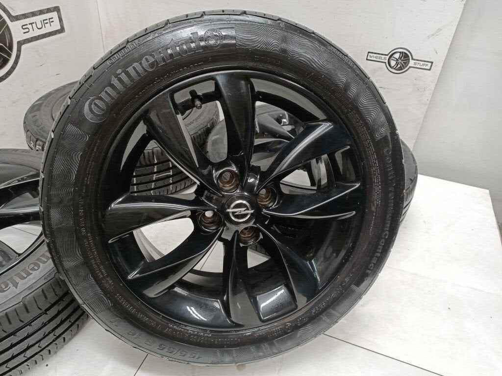 Opel Corsa zwart lichtmetaal velgen 16 4x100, Ophalen, Gebruikt, 16 inch, Banden en Velgen