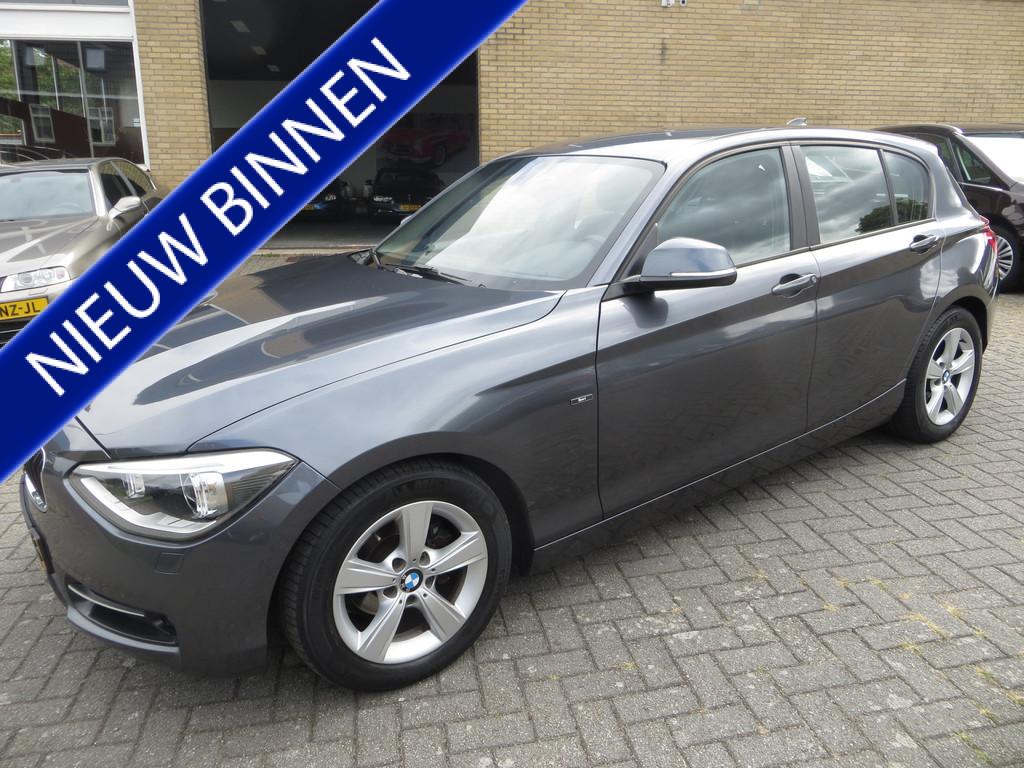BMW 1-serie 116i EDE Business Exec. NAVI-NAP-NEDERL.-GARANTI, Auto's, BMW, 1-Serie, Gebruikt, 4 cilinders, Origineel Nederlands