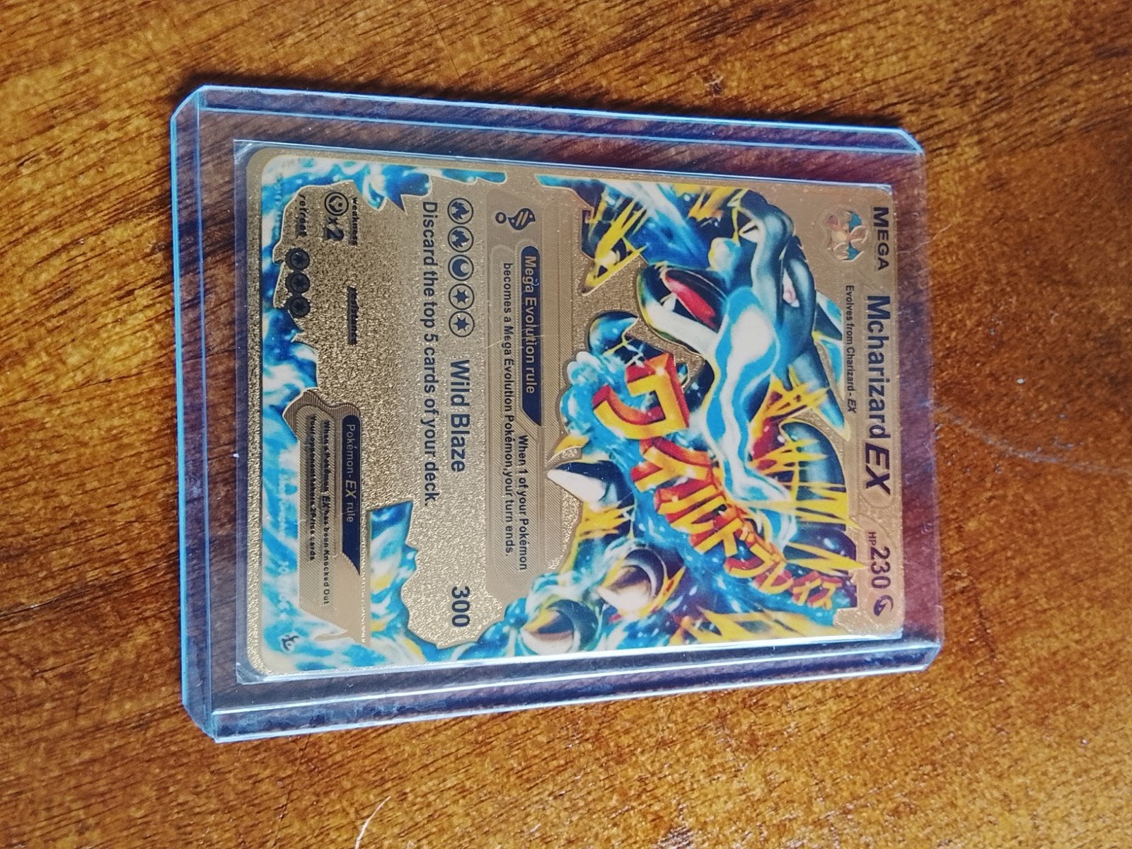 M Charizard EX Gouden Pokemon Kaart - Mega Charizard EX, Ophalen of Verzenden, Zo goed als nieuw, Losse kaart, Foil