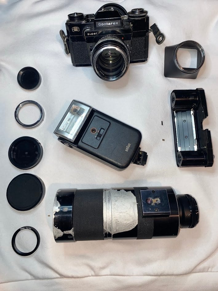 Contarex super 35mm camera + Carl Zeiss planar en toebehoren, Ophalen of Verzenden, Gebruikt, Spiegelreflex, Overige Merken